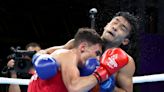 Boxing star Lynch credits tactical change for opening Commonwealth victory