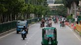 Bangladesh factories, banks reopen as curfew is eased after protests taper off