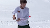 Man Attempts Never-Been-Done Snowboarding Golf Trick Shot