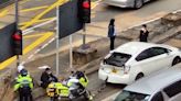 堅拿道天橋警察電單車與私家車相撞 警員受傷送院