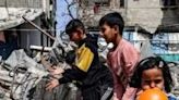 Children amid the rubble of a destroyed building in Rafah in the southern Gaza Strip on April 5, 2024.