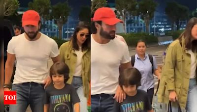 Kareena Kapoor and Saif Ali Khan twin in white, spotted with Taimur and Jeh at airport | - Times of India