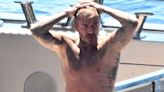 David Beckham gives himself a good hose down in his tighty whities on a yacht