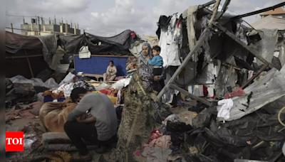'We have nothing.' As Israel attacks Rafah, Palestinians are living in tents and searching for food - Times of India