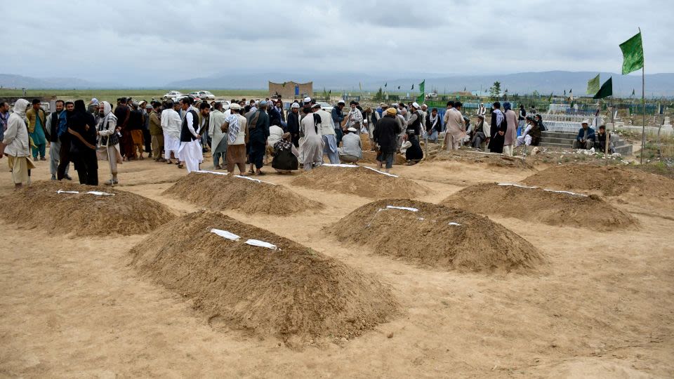 Children pulled from mud as hundreds die in severe flooding in Afghanistan