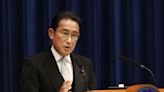 Japan Premier Returns to Work After Positive Test for Covid