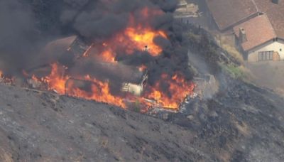 Edgehill Fire burns down homes, trailers, cars in San Bernardino County