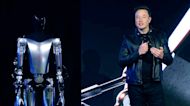 Watch: Musk Reveals Tesla Robot Optimus as It Walks Slowly on Stage