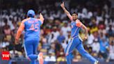 Watch: Arshdeep Singh takes off his T20 World Cup medal and heartwarmingly makes his parents wear it | Cricket News - Times of India