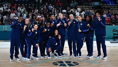 Photos of former Notre Dame women's basketball players winning gold