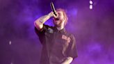 Post Malone has bruised ribs after falling through stage in St Louis