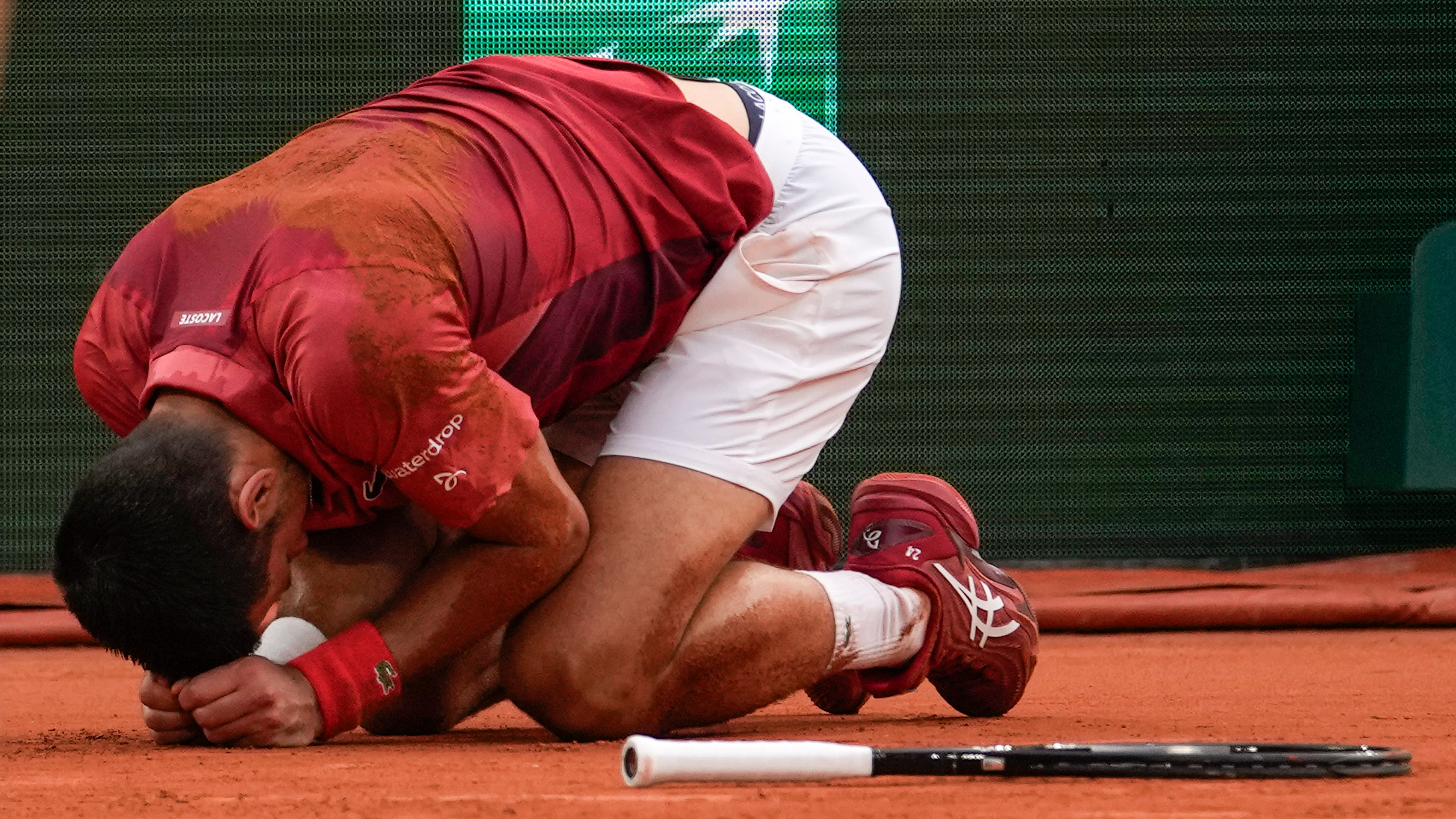 Novak Djokovic limps to quarter-finals after longest French Open match of career