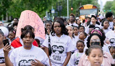 Hundreds march to demand more help finding Black girls and women who are missing — but never forgotten