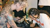 Machine Gun Kelly's Daughter Kicks Off Summer by Tattooing Dad During Travels to France's Hellfest