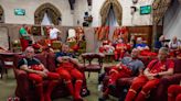 Striking photo shows Beefeaters taking a break from 20 minute shifts holding vigil in Westminster Hall