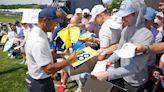 Tiger Woods draws massive crowd at PGA practice round