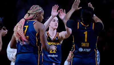 Raucous crowd roars its approval for Caitlin Clark in her home debut with Fever, an 83-80 win