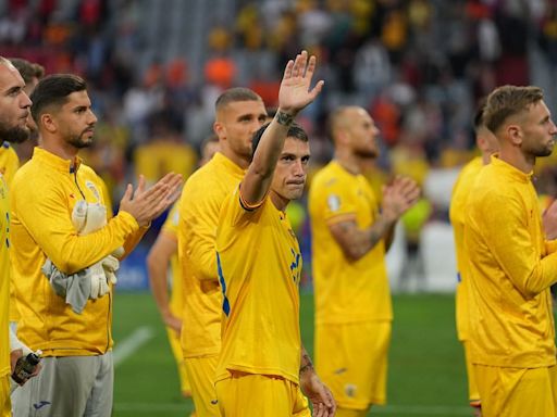 Fans praise 'classy' Romania as dressing room pictures go viral