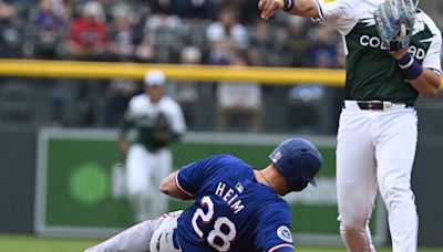 Colorado's defensive gems lead sweep of defending World Series champion Rangers | Rockies Rewind