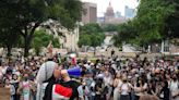 Pro-Palestinian, labor rights groups hold May Day protest Sunday at UT Tower