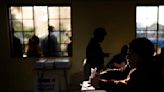 South Africans vote in a pivotal election as president says he has no doubt his ANC party will win