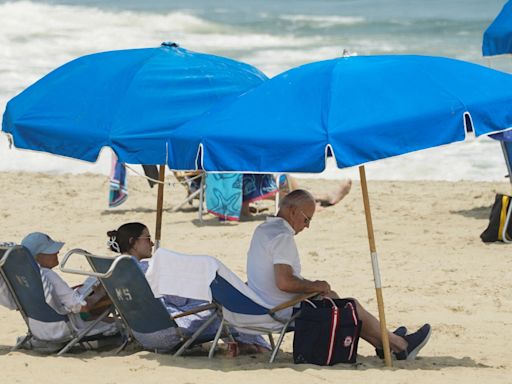 President Joe Biden lounges on beach amid retreat from public view