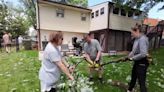 Neighborhood rallies to clean up after tornado