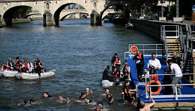 ‘After the Games, we will have a swimming pool in the river’: Paris mayor takes dip in Seine amid E. coli bacteria concerns