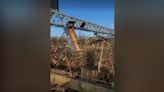 Truck wedged in overhead gantry closes M5 motorway