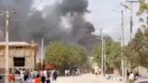The death toll from a truck bomb at a checkpoint in Somalia rises to 21