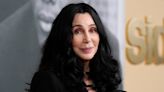 Cher, 77, packs on PDA with boyfriend Alexander Edwards, 38, at Paris party