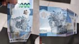 Folded new P1,000 polymer banknote viral post forces BSP, SM to backtrack