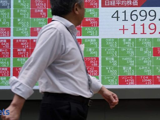 Japan's Nikkei drops from record high on chip selloff, yen intervention nerves