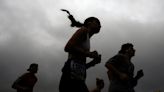 Runners are used to toughing it out. A warming climate can make that deadly