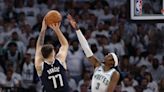 Doncic carries Dallas past the Wolves late to steal Game 1 in Minnesota