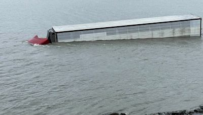 Semi-truck goes off the road, ends up in water near Portage