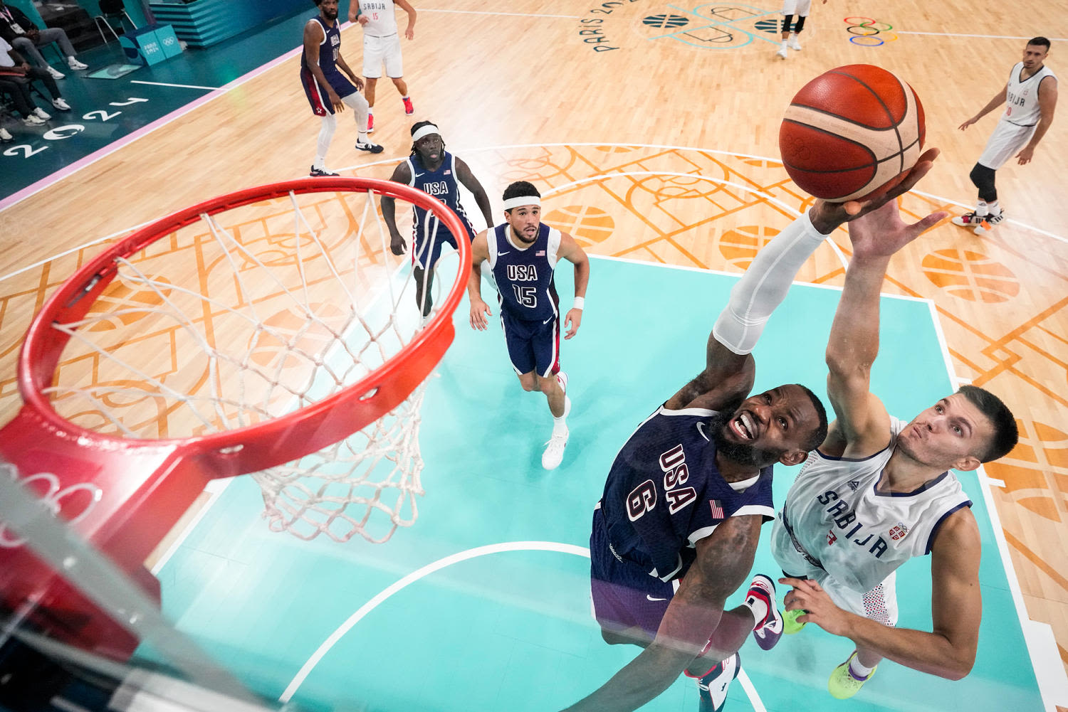 USA men's basketball begins gold medal defense with dominant win over Serbia