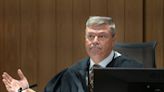 Judge scolds sheriff over video of deputy killing, tells prosecutor 'control your witnesses'