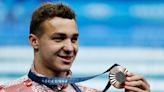 Swimming-Acrobats' son Kharun flips script to win medal for Canada