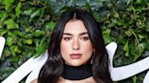 Dua Lipa Shows Off Her Incredible Body In Black Yoga Pants And Sports Bra While Sharing Wellness Tips For The New...