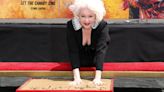 Cyndi Lauper cements hand and footprints at TCL Chinese Theatre