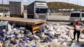 Israeli activists block Gaza aid convoy and pour out sugar