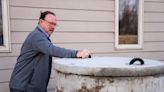 Wells dry and utility service denied, some Des Moines residents rely on trucked-in water