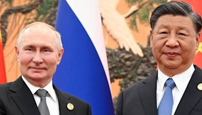 Putin meeting Xi after UK warns China and Russia pose 'immediate threats'