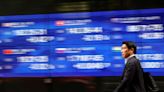 Asia stocks hit 27-month top, dollar slips on rate cut talk