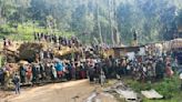 Papua New Guinea says more than 2,000 people buried in landslide as it formally asks for help