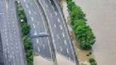 The German chancellor tours flooded regions in the southwest in a show of solidarity