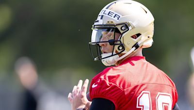 A First Look At Quarterback Spencer Rattler In His Full New Orleans Saints Uniform At The NFLPA Rookie Premiere