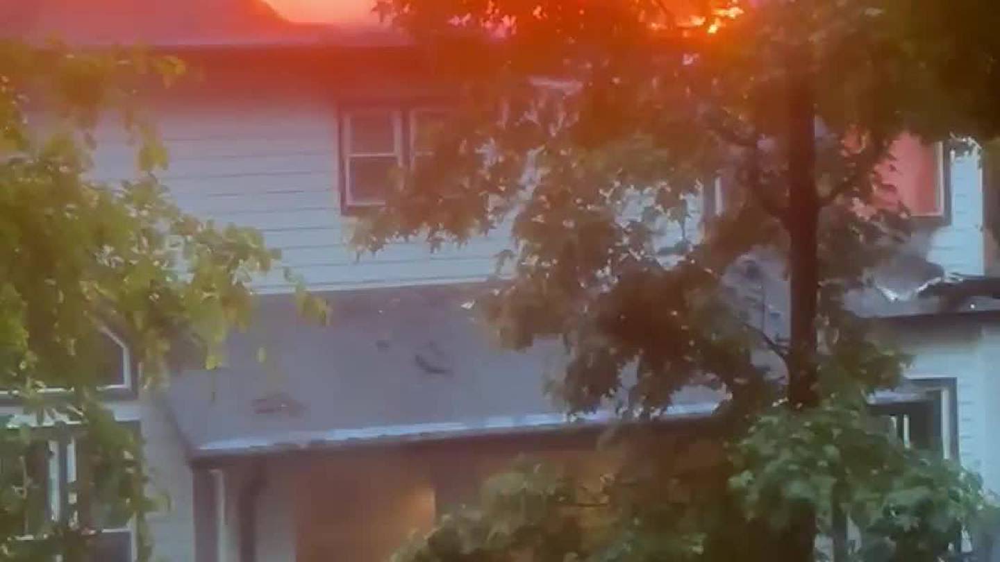 Roswell home bursts into flames after apparent lighting strike during storms