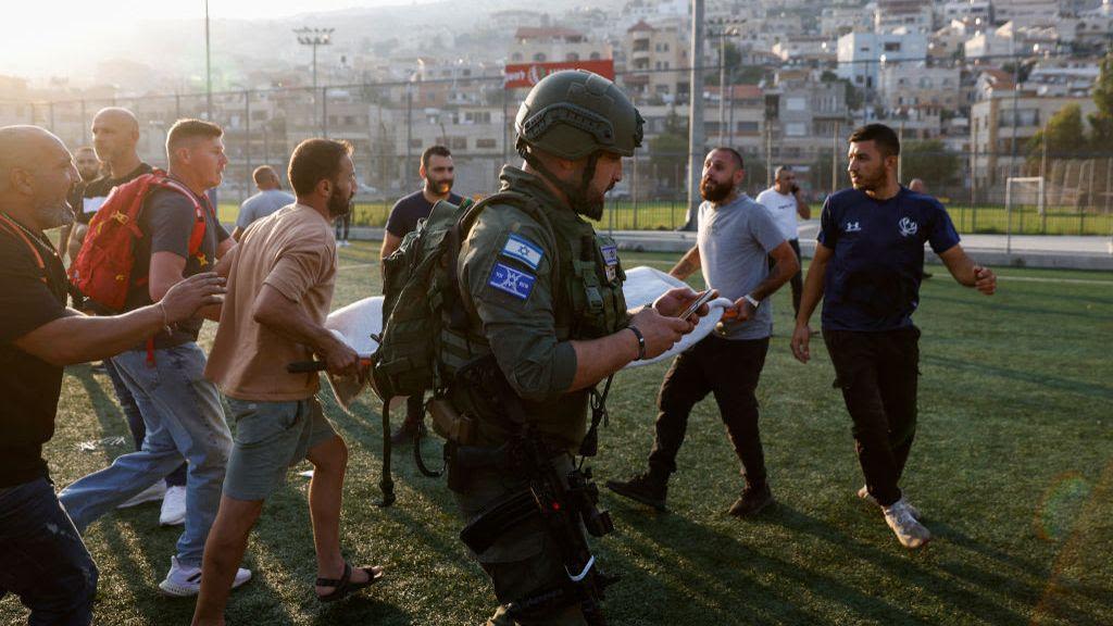 Israel hits Hezbollah targets in Lebanon after deadly football pitch attack